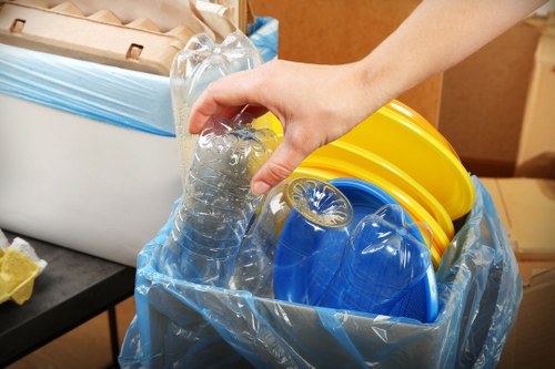 Recycling bins with different materials in an office setting