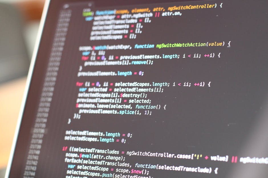 A computer screen displaying a code editor with lines of HTML and CSS code in various colors, including HTML tags in orange, class attributes in blue, and URLs in yellow. The code is visible on a dark